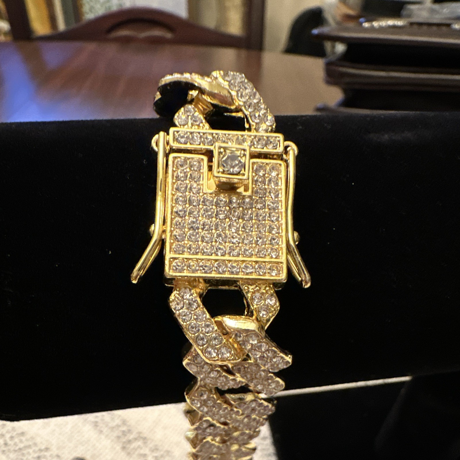 Gold Tone Cuban Link Chain Bracelet with Pavé Setting and Box Clasp Closure