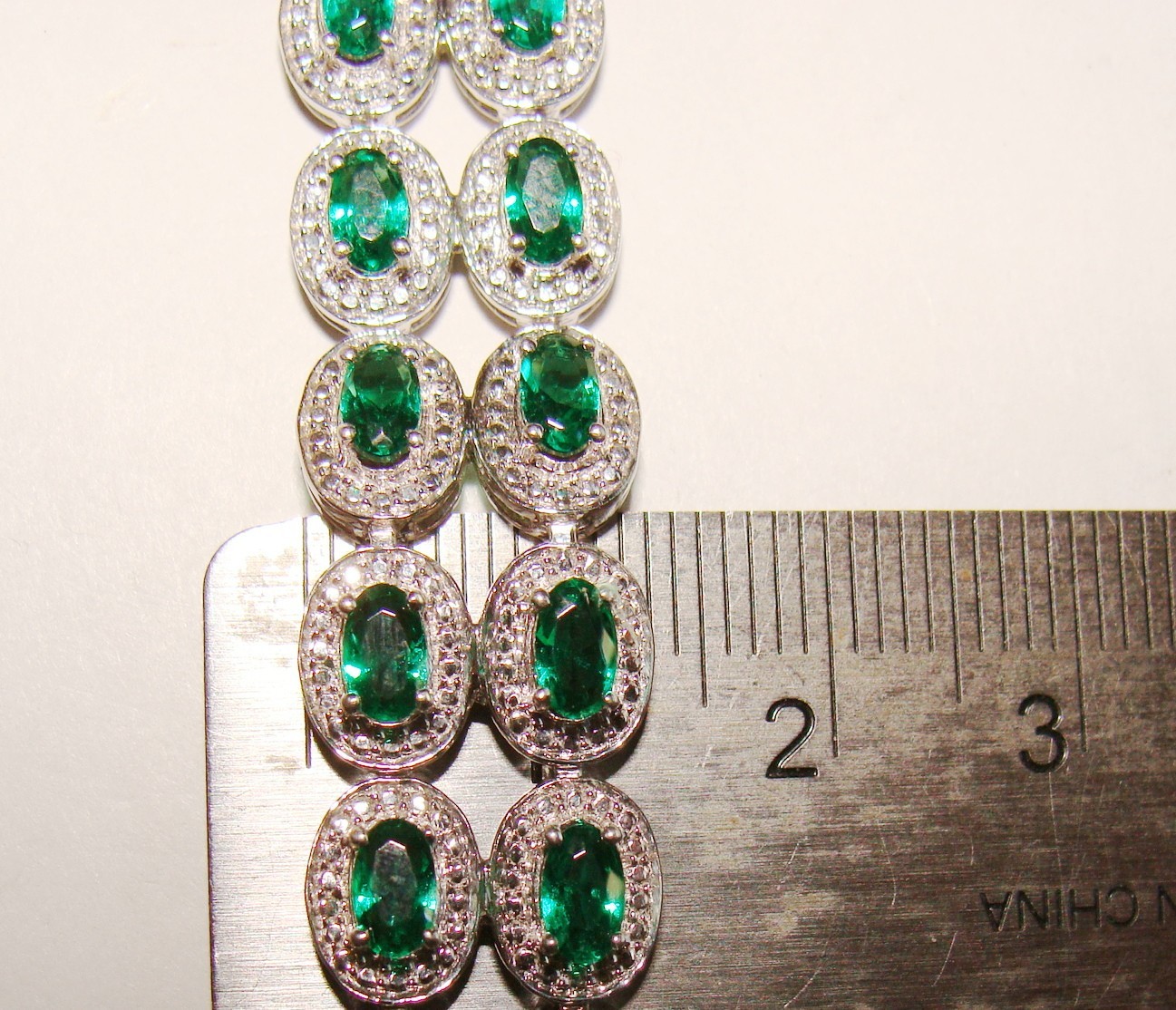 Designer 22.4g Sterling Silver Lab Created Emeralds & 4 Clear Stones Bracelet 7″