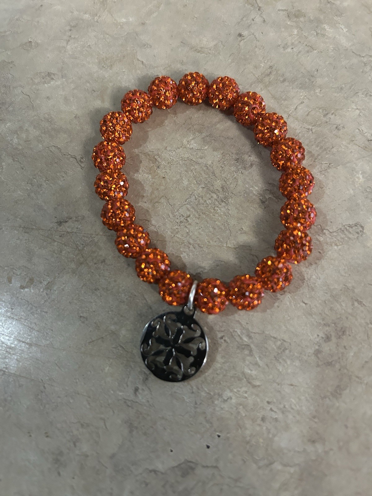 Rustic Orange Stretch Beaded Bracelet With Logo Charm
