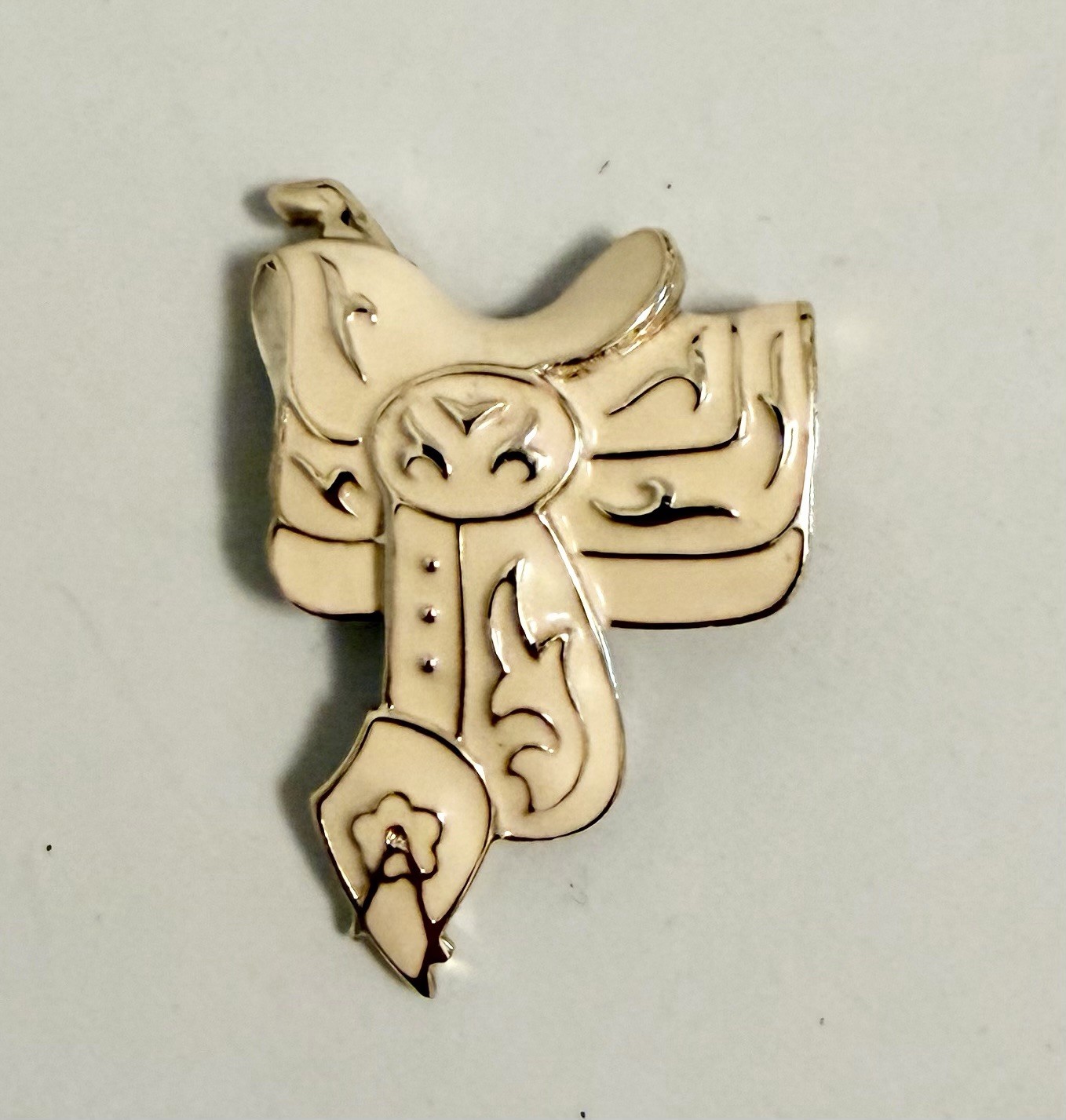 White Western Saddle Pin Metal And Enamel Cowboy Brooch Rodeo Vintage Jewelry