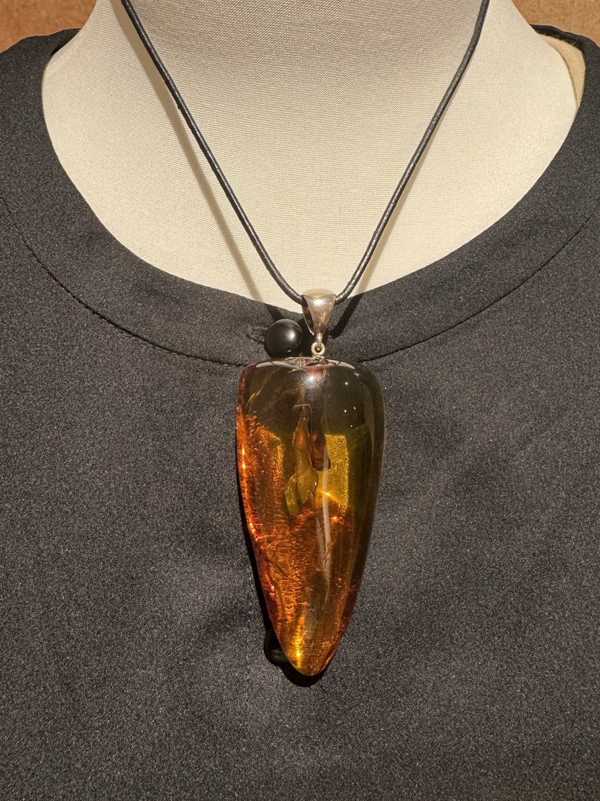 Natural Baltic amber pendant with plant inclusions, Sterling Silver Bail- 38.3g